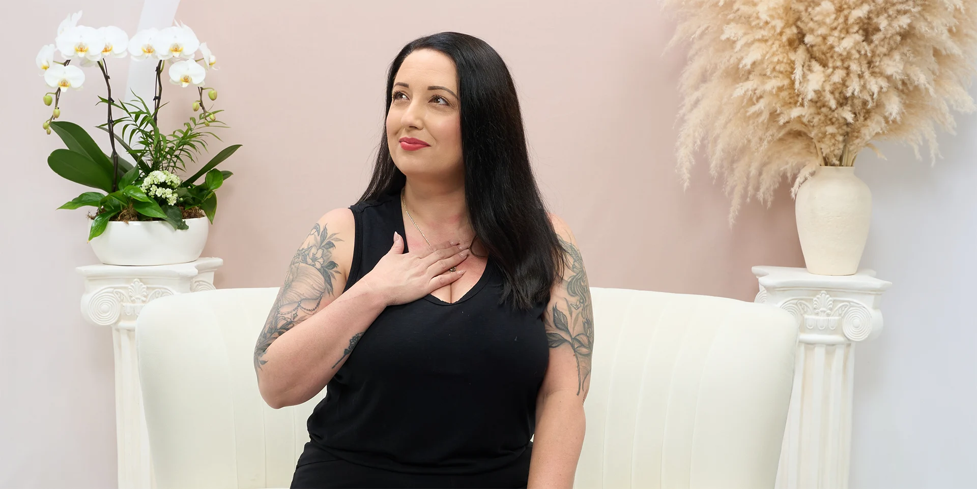 Courtney Dawson seated and looking to the side
